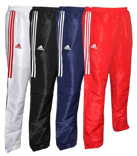 white Adidas tracksuit pants